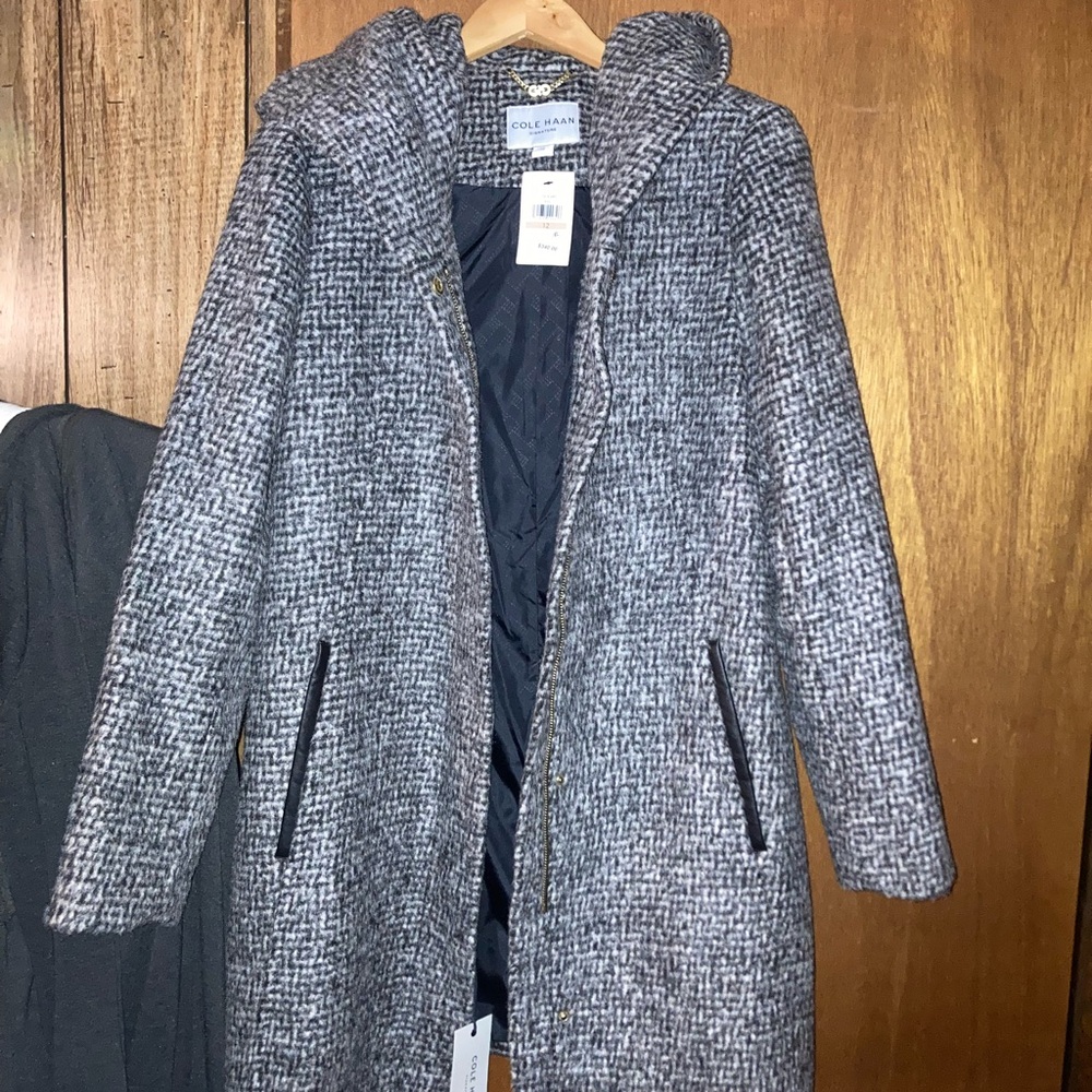 Cole Haan women’s wool coat. 3/4 length, new with tags, size 12